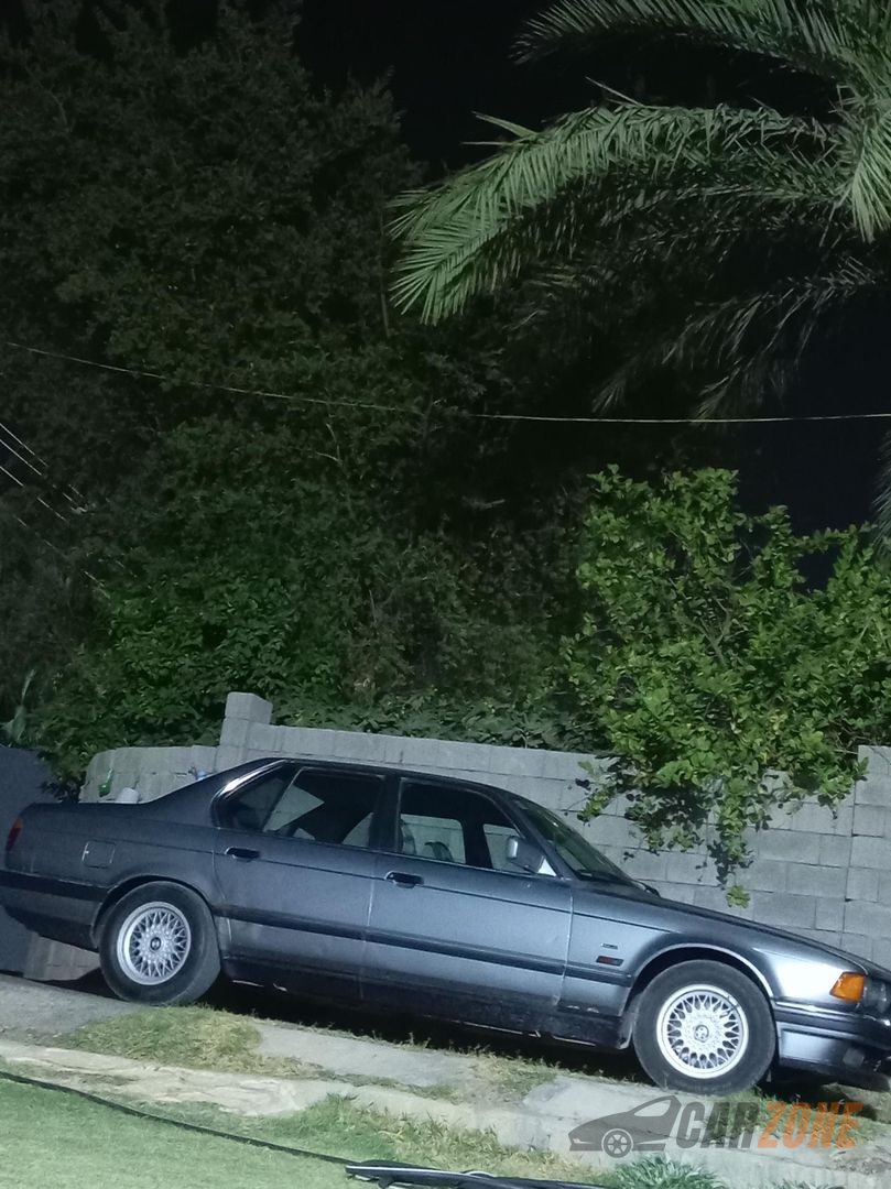 1991 BMW الفئة السابعة 730i — صورة 2